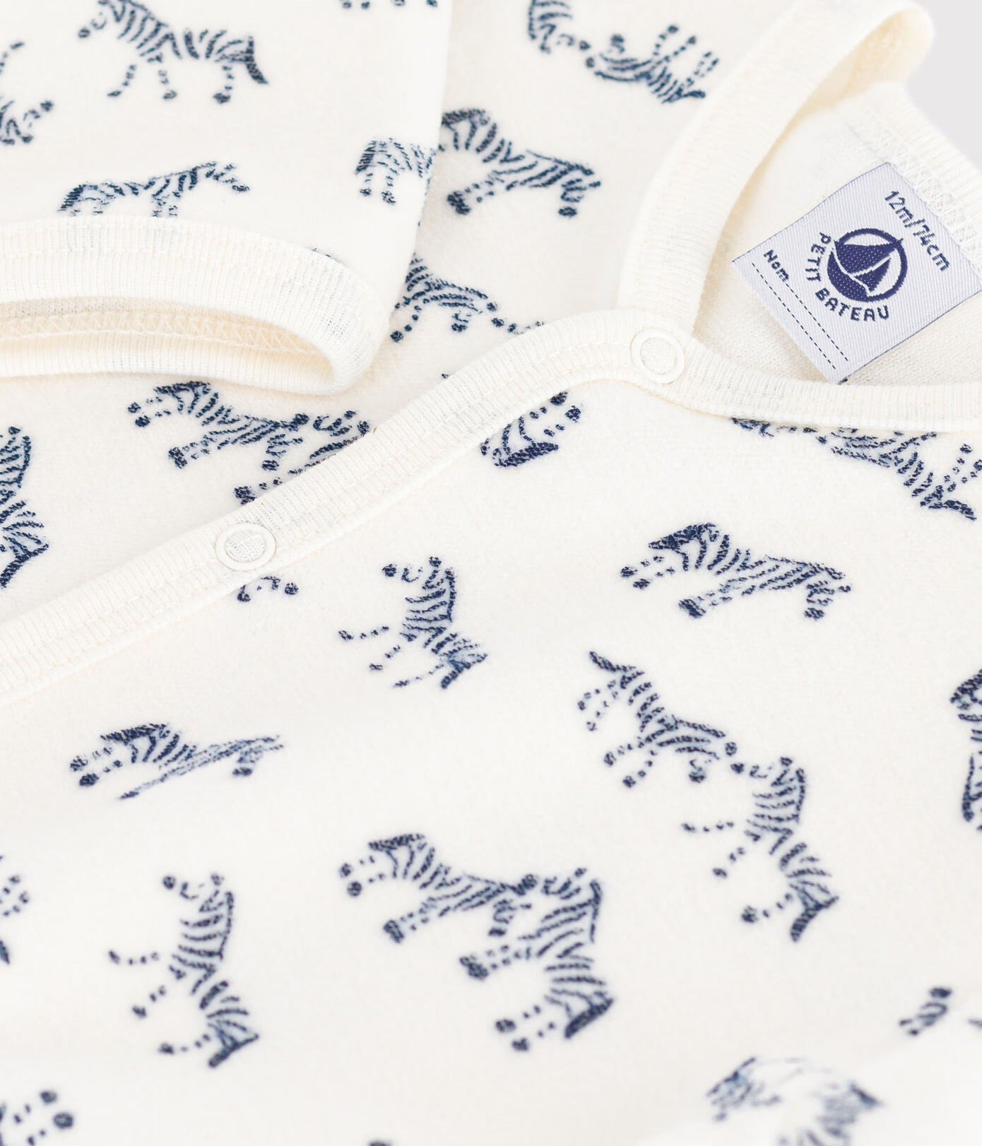 Fluwelen babypyjama met zebraprint