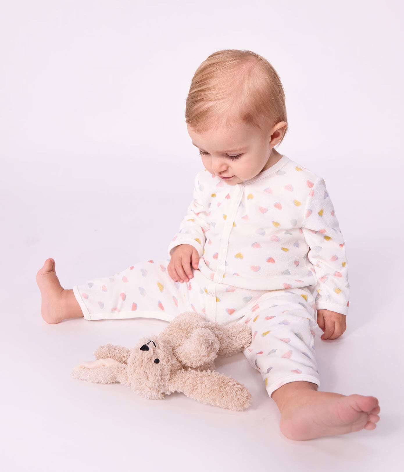 Fluwelen babypyjama zonder voetjes met hartjesprint