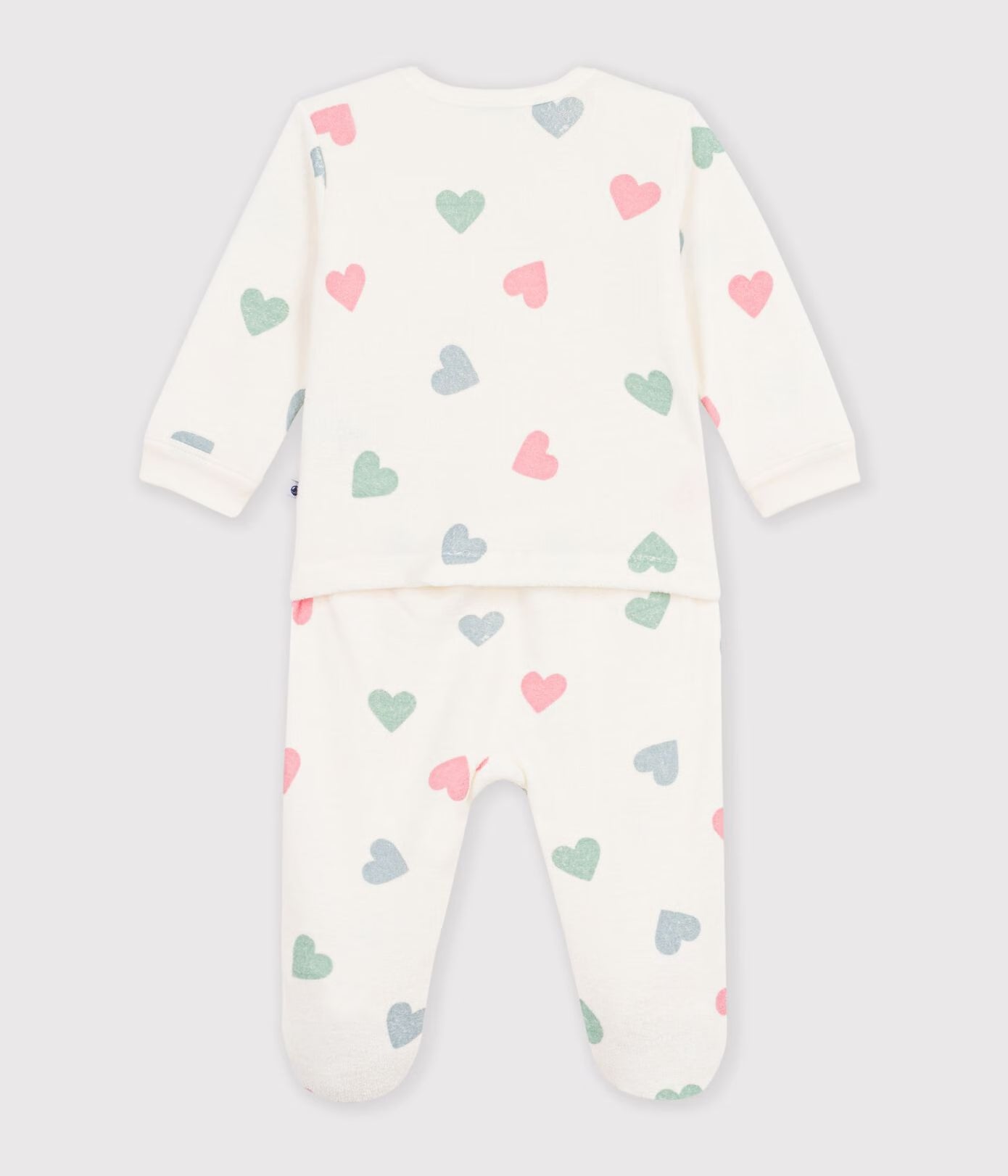 Babypyjama van katoenen badstof, zonder drukknoopjes, en met hartjesprint